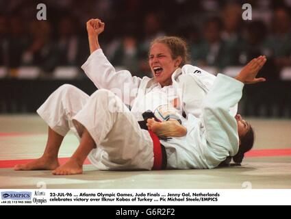 23-JUL-96. Atlanta Olympic Games, Judo Finals. Jenny Gal, Netherlands celebrates victory over Ilknur Kobas of Turkey Stock Photo