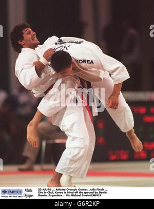 23-JUL-96, Atlanta Olympic Games, Judo Finals, Cho In-Chul, Korea is lifted off the ground by Daniel Garcia, Argentina Stock Photo