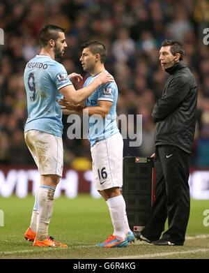 Soccer - FA Cup - Third Round - Replay - Manchester City v Blackburn Rovers - Ewood Park. Manchester City's Sergio Aguero (centre) is brought on for team-mate Alvaro Negredo Stock Photo