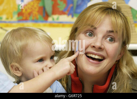 TV presenter Gail Porter and her daughter Honey, aged 16 months during a photocall for the launch of Playhouse Disney National Friendship Week (9 - 13 February 2004) - the first campaign of its kind to support UK children and parents adjustment to nursery life, and which includes the creation of a friendship card for the Make-A-Wish Foundation - at the Little People Nursery in west London. Stock Photo