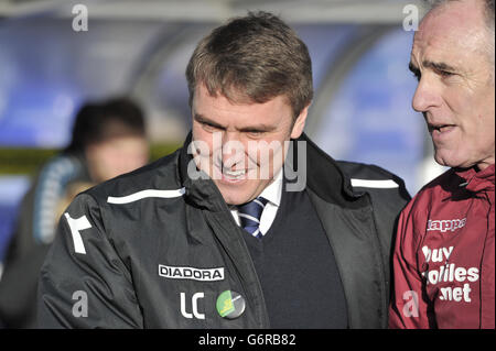 Birmingham City manager Lee Clark (left) and Derby County goalkeeping coach Eric Steele greet each other before kick-off Stock Photo