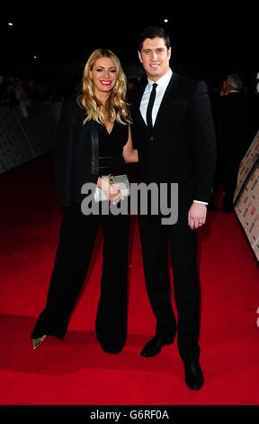 Tess Daly and Vernon Kay arriving for the 2014 National Television Awards at the O2 Arena, London. Stock Photo