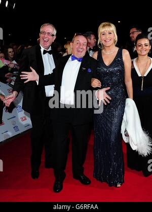 (left to right) Rory Cowan, Brendan O'Carroll and Jennifer Gibney arriving for the 2014 National Television Awards at the O2 Arena, London. Stock Photo