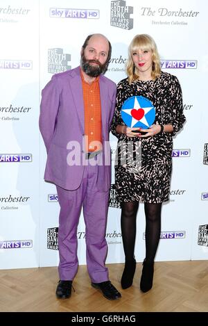 Katie Paterson wins the Visual Art award, presented by Gavin Turk, at the South Bank Sky Arts Awards at the Dorchester Hotel, London. Stock Photo