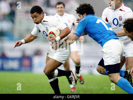 England's Jason Robinson (left) is challenged by Italy's Andrea Masi during their RBS 6 Nations match at the Stadio Flaminio in Rome, Italy. England won 50-9. Stock Photo