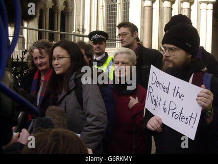 Anti-war protester Jane Laporte (centre, left) is joined by London's Deputy Mayor Jenny Jones (far left) as she speaks to journalists outside the High Court in central London. She was speaking after a group of demonstrators won their legal battle over a police decision to detain three coachloads of peace activists on their way to an anti-war protest. They took legal action after being prevented from attending the vigil at RAF Fairford in Gloucestershire in March last year. Stock Photo