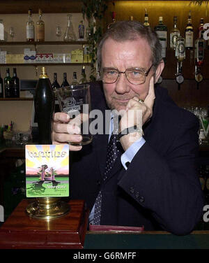 Richard Caborn MP (Sheffield) in the Strangers bar in the House of Commons, pictured in front of a Sheffield brewery pump. Mr Cabourn has an empty glass as the beer has run out, such is it's popularity. Stock Photo