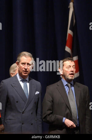 The Prince of Wales and Home Secretary, David Blunkett, sing the national anthem during a citizenship ceremony at Brent Town Hall, London. The ceremony has been created by Blunkett to make getting a British passport more of an occasion. Stock Photo