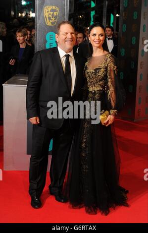 Harvey Weinstein and Georgina Chapman arriving at The EE British Academy Film Awards 2014, at the Royal Opera House, Bow Street, London. Stock Photo