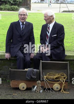 Survivors of the Stalag Luft III camp in Sagan, Germany, Squadron Leader Bertram 'Jimmy' James (left) and Flight lieutenant Sydney Dowse at London's Imperial War Museum, with a mock-up trolley that was used in the 1944 escape, on the 60th anniversary of the remarkable breakout. The breakout was immortalised in the celebrated 1963 film, The Great Escape, starring Steve McQueen, Charles Bronson and James Garner. Stock Photo