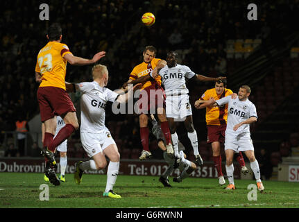 Bradford City's James Hanson (left) and Port Vale's Anthony Griffith in action during the Sky Bet League One match at the Coral Windows Stadiums, Bradford. Stock Photo