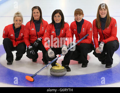 Team GB female curling team members with skip Eve Muirhead (centre) and (left to right) Anna Sloan, Vicki Adams, Claire Hamilton and Lauren Gray pose for a photograph as they prepare for Sochi at The Peak, Stirling. Stock Photo