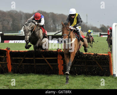Seeyouatmidnight and Ryan Mania (right) win the Betfred Mobile Hurdle Race during Betfred Grand National Trial Day at Haydock Park, Newton-le-Willows. Stock Photo