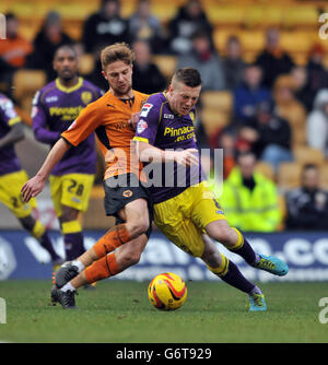 Wolverhampton Wanderers's Michael Jacobs (left) and Callum McGregor Notts County's (right) challenge for the ball Stock Photo