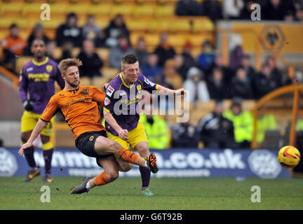 Wolverhampton Wanderers's Michael Jacobs (left) and Callum McGregor Notts County's (right) challenge for the ball Stock Photo