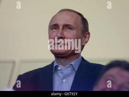 Russian President Vladimir Putin watches USA play Russia during their Preliminary round match at the Bolshoy Ice Dome, during the 2014 Sochi Olympic Games in Sochi, Russia. Stock Photo