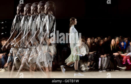 NOTE NUDITY Models on the catwalk during the Mark Fast London Fashion