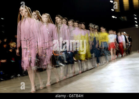 NOTE NUDITY Models on the catwalk during the Mark Fast London Fashion