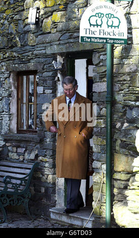 The Prince of Wales leaves The Flock-in Tea-room (next to Yew Tree Farm) in Borrowdale, nr Keswick, Cumbria. Later Charles is due to launch a new guide, How to Save Your Local Pub, at The Old Crown in Hesket Newmarket as part of his The Pub is the Hub initiative. Stock Photo