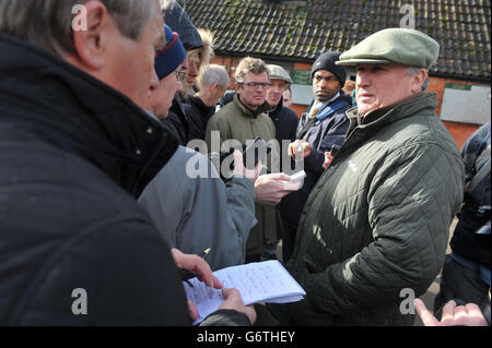 Horse Racing - Paul Nicholls Stable Visit - Manor Farm Stables. Trainer Paul Nicholls (right)) speaks with journalists during the stable visit to Manor Farm Stables, Ditcheat. Stock Photo