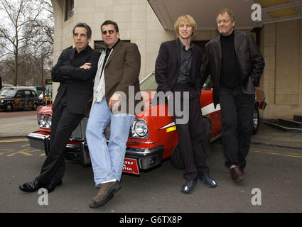 The original actors from 'Starsky and Hutch', Paul Michael Glaser (second left), David Soul right) pose with actors Ben Stiller (left) and Owen Wilson (second right0, during a photocall at The Dorchester Hotel on Park Lane in London, ahead of the film premiere of 'Starsky and Hutch' at London's Leicester Square. Ben Stiller plays Starsky (Glaser) and Owen Wilson plays Hutch (Soul) in the big-screen remake of the legendary 70's Detective series. Stock Photo