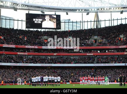 General view of the two team's as they observe a minute's silence in remembrance of former Preston North End and England footballer Sir Tom Finney Stock Photo