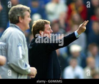 Portsmouth FC manager Harry Redknapp (right) and Birmingham City FC's Steve Bruce on the sideline during the Barclaycard Premiership match at Fratton Park, Portsmouth. Stock Photo