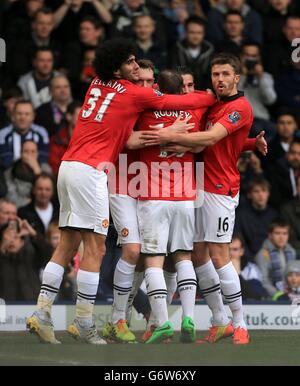 Soccer - Barclays Premier League - West Bromwich Albion v Manchester United - The Hawthorns. Manchester United's Phil Jones (centre) celebrates with his team-mates after scoring his team's opening goal Stock Photo