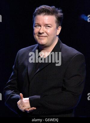 Comedian Ricky Gervais performs on stage during The Cream Of British Comedy night at the Royal Albert Hall in London. The evening of comedy is part of 'The Who And Friends' annual week of fundraising gigs in aid of the Teenage Cancer Trust. Stock Photo
