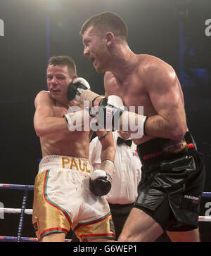 Boxing - WBO Lightweight Title - Ricky Burns v Terence Crawford - Undercard - SECC. Scott Cardle (right) in action against Paul Appleby during their Lightweight bout at the SECC, Glasgow. Stock Photo