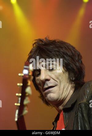 Ronnie Wood performs on the stage during Ronnie Lane Tribute concert at The Royal Albert Hall, in central London. Stock Photo