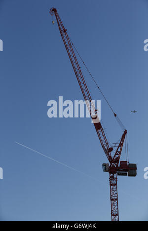 Constuction in Victoria, London - stock. A late afternoon view of a crane on a construction site adjacent to London Victoria station. Stock Photo