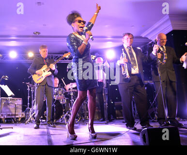 Floella Benjamin performs during the Macmillan Cancer Support annual Parliamentary Palace of Varieties fundraising evening at the Intercontinental London Park Lane, London. Stock Photo