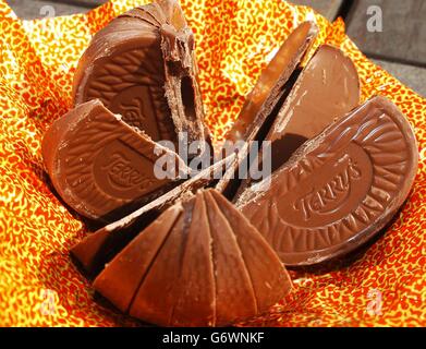 A Terry's chocolate orange, broken into segments. The chocolate manufacturer which makes chocolate products including Terry's Chocolate Orange and Terry's All Gold, announced it was to close its UK plant, with the loss of more than 300 jobs. Stock Photo