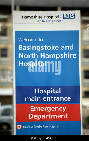 General view of signage for the Basingstoke and North Hampshire Hospital outside the main entrance Stock Photo