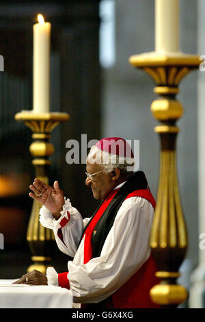 South African Anglican prelate and veteran anti-apartheid campaigner Archbishop Desmond Tutu, attends a service of thanksgiving at St. Paul's Cathedral, London, to celebrate the 10th anniversary of the birth of democracy in South Africa. Stock Photo