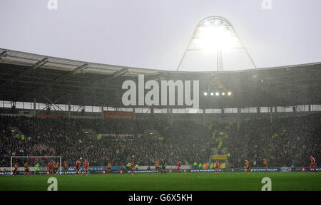 Soccer - Barclays Premier League - Hull City v West Bromwich Albion - KC Stadium. A general view of the action as heavy rain falls during the Barclays Premier League match at the KC Stadium, Hull.