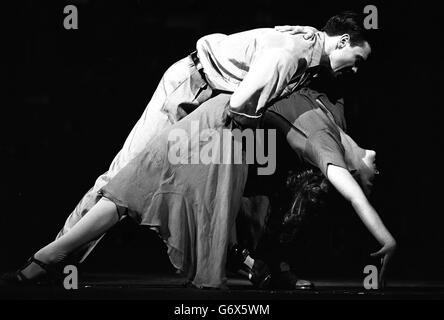 Catherine Zeta Jones and Philip Gould dancing during a dress rehearsal at the London Coliseum of a new production by the English National Opera and Scottish opera of Kurt Weill's two-act opera 'Street Scene'. The opera, set in New York in a late 1930's summer, is described as a portrait of ordinary urban life, with the action centred on an apartment block and the families who live in it. Stock Photo