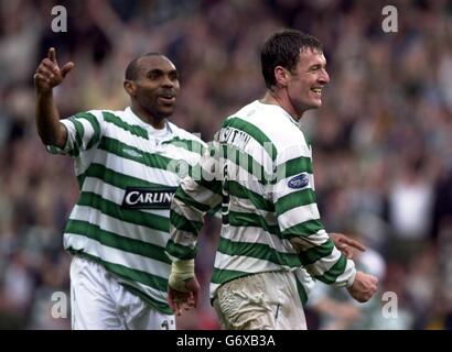 Celtic's Chris Sutton (right) celebrates with team-mate Didier Agathe after scoring against Livingston FC during the Tennent's Scottish Cup semi-final at Hampden Park, Glasgow. Stock Photo