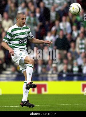 Celtic's Henrik Larsson scores against Livingston FC during the Tennent's Scottish Cup semi-final at Hampden Park, Glasgow. Stock Photo