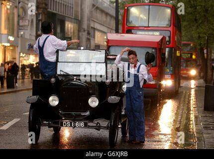 Laural and Hardy impersonators Jem Farser (left) and Graham Hardy, create 'another fine mess' outside HMV Oxford Street, to promote the 75th anniversary of the comic duo's first talking film, and the release of a video collection. Stock Photo