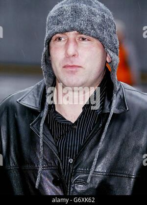 David Chick, also known as spiderman, from Brighton in Sussex, arrives at Southwark Crown Court in London, on trial for allegedly causing a public nuisance after climbing a crane dressed as spiderman in protest for the group 'Fathers for Justice'. 11/09/04: David Chick from Sussex, arriving at Southwark Crown Court in London to face a charge of causing a public nuisance after climbing a crane dressed Spiderman. Protester David Chick, 37, has climbed 450 feet up on top of the London Eye, South Bank, London once more in a Spiderman outfit. Stock Photo