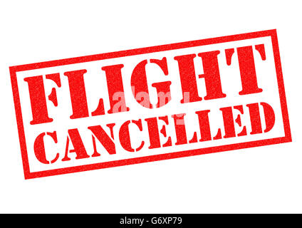 FLIGHT CANCELLED (British spelling) red Rubber Stamp over a white background. Stock Photo