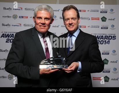 Southend United's Frank Banks (left) recieves the Tokio Marine Unsung Hero award from Tokio Marine's Executive Operations Officer Alastair Blundell at the Football League Awards 2014 Stock Photo