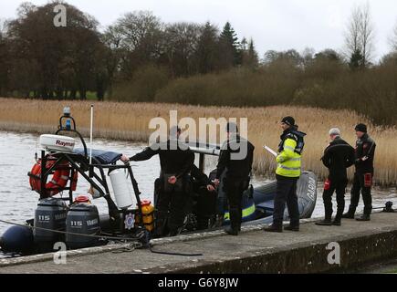 Members of the Garda sub aqua unit at Hodson Bay, as they prepare to join the search of Lough Ree in Co Westmeath, for a man who is still missing following an accident where the boat he was in with two others capsized yesterday afternoon. Stock Photo