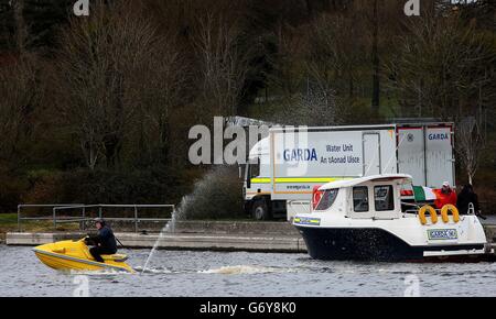 A local man joins the search of Lough Ree in Co Westmeath, for a man who is still missing following an accident where the boat he was in with two others capsized yesterday afternoon. Stock Photo