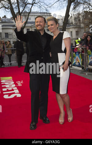 Ricky Gervais with partner Jane Fallon arriving at the celebrity screening of Muppets Most Wanted at the Curzon Mayfair in central London. Stock Photo