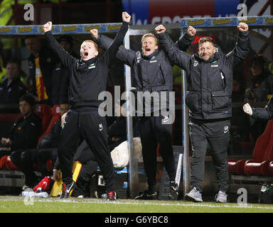 Celtic Manager Neil Lennon (left) celebrates during the Scottish Premier League match at Firhill Stadium, Glasgow. Stock Photo