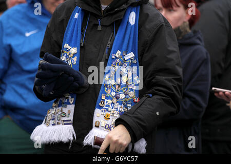 Soccer - Barclays Premier League - Everton v Swansea City - Goodison Park. An Everton fan's scarf with various club badges on it Stock Photo