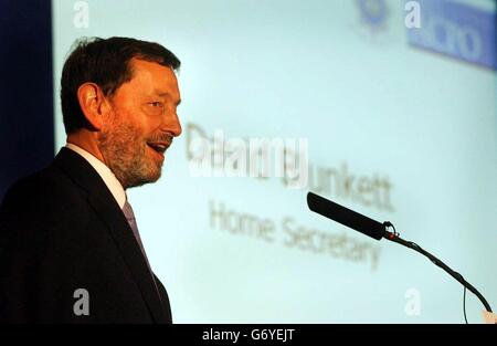 Home Secretary David Blunkett during a speech to the Association of Chief Police Officers (Acpo) at Birmingham's National Exhibition Centre. The Home Secretary was discussing the challenges of 21st century policing, re-iterating the particular challenges of organised crime. He was also speaking of his desire to clarify currently confusing police accountability arrangements. Stock Photo
